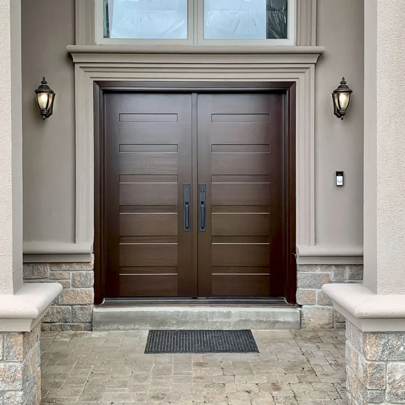 Dark brown double front doors with horizontal panels